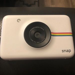 Polaroid camera with film